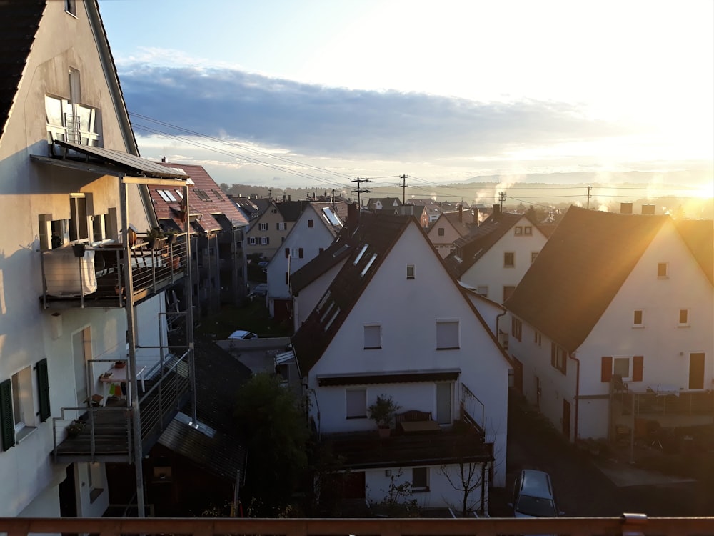 white and brown houses under blue sky during daytime