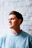 man in white crew neck shirt