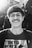 grayscale photo of man in crew neck shirt and eyeglasses