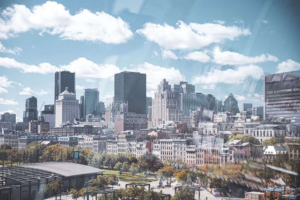 city buildings under blue sky during daytime