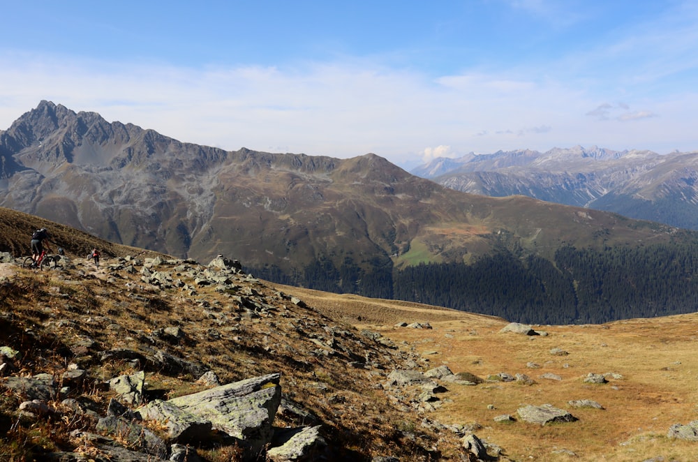 brown and green mountains under blue sky during daytime