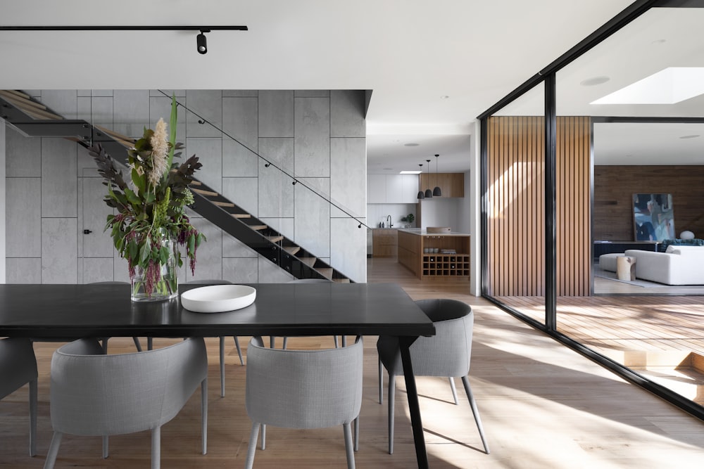 black wooden table and chairs