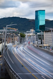cars on road near buildings during daytime