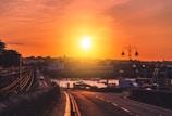 A vibrant sunset over a picturesque coastal town.