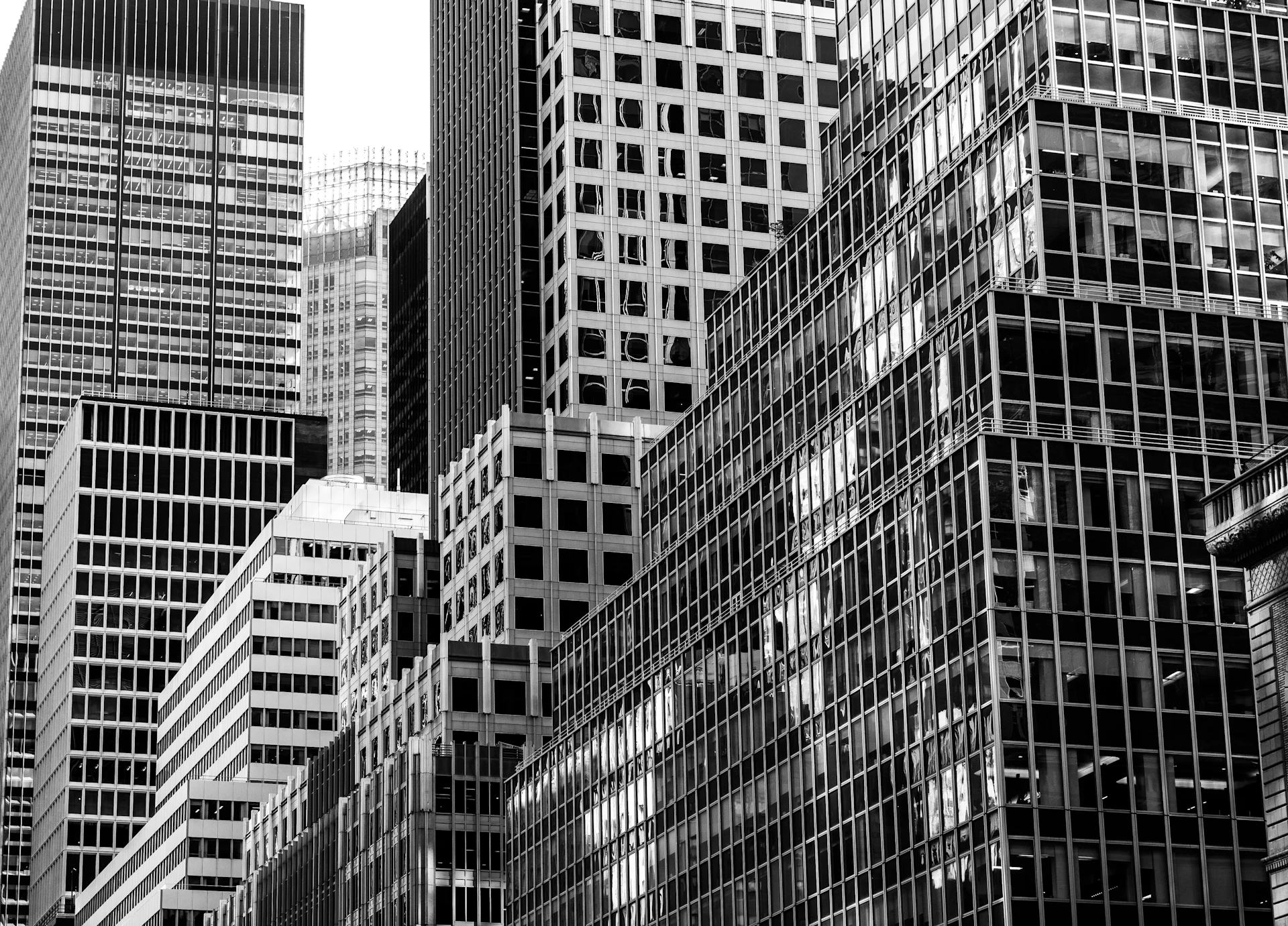grayscale photo of high rise buildings