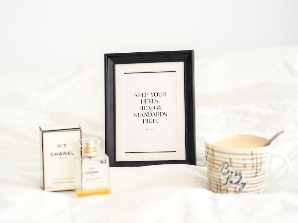 black wooden frame with quote