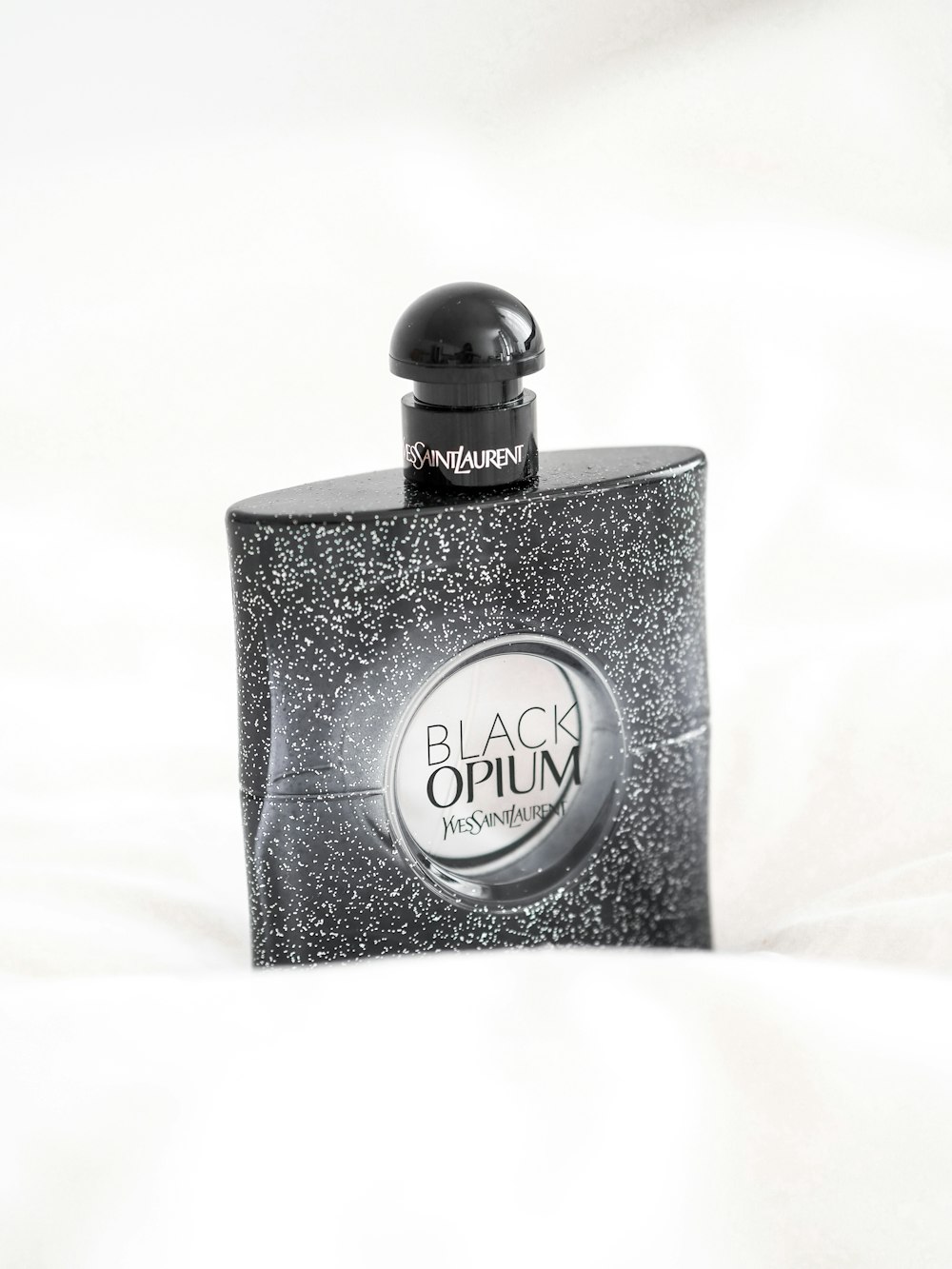 black and silver perfume bottle
