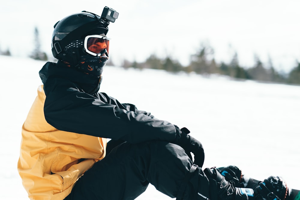 man in black jacket wearing black helmet