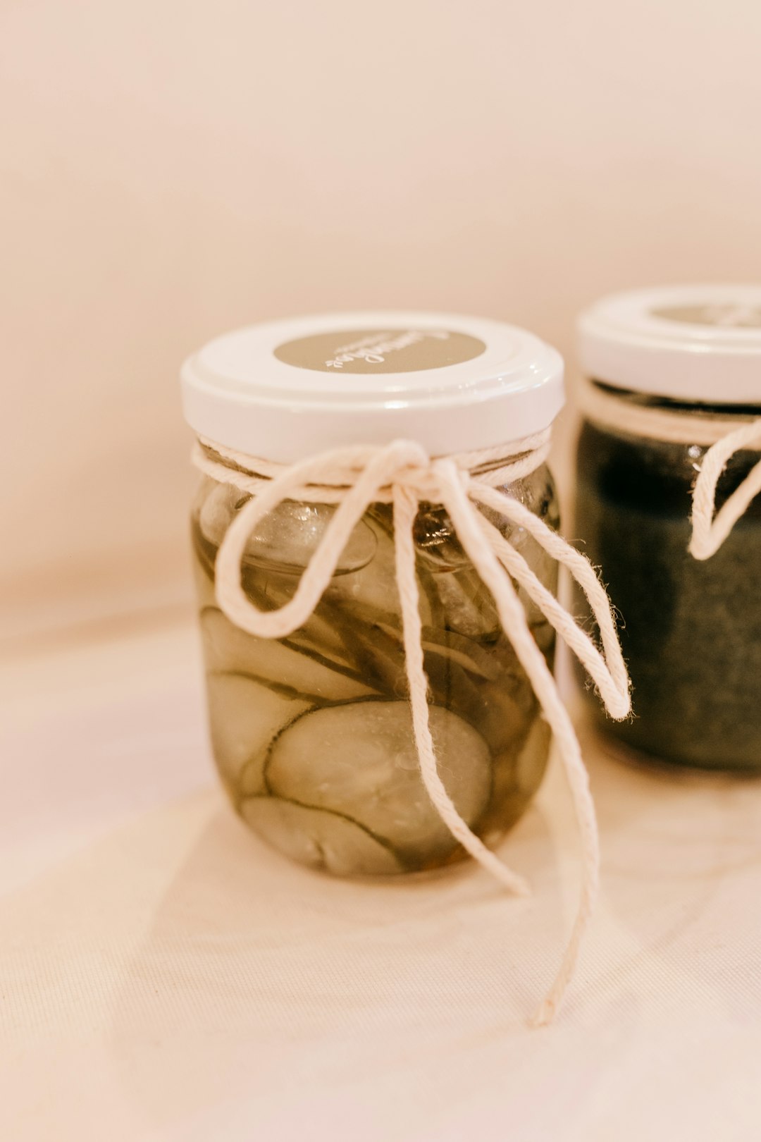 white and green ceramic jar