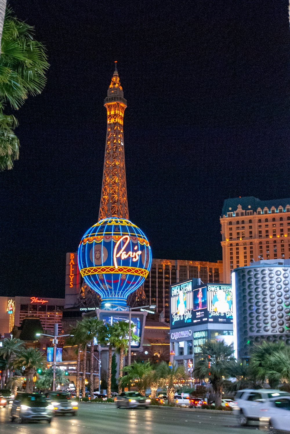 red and blue tower with lights during night time