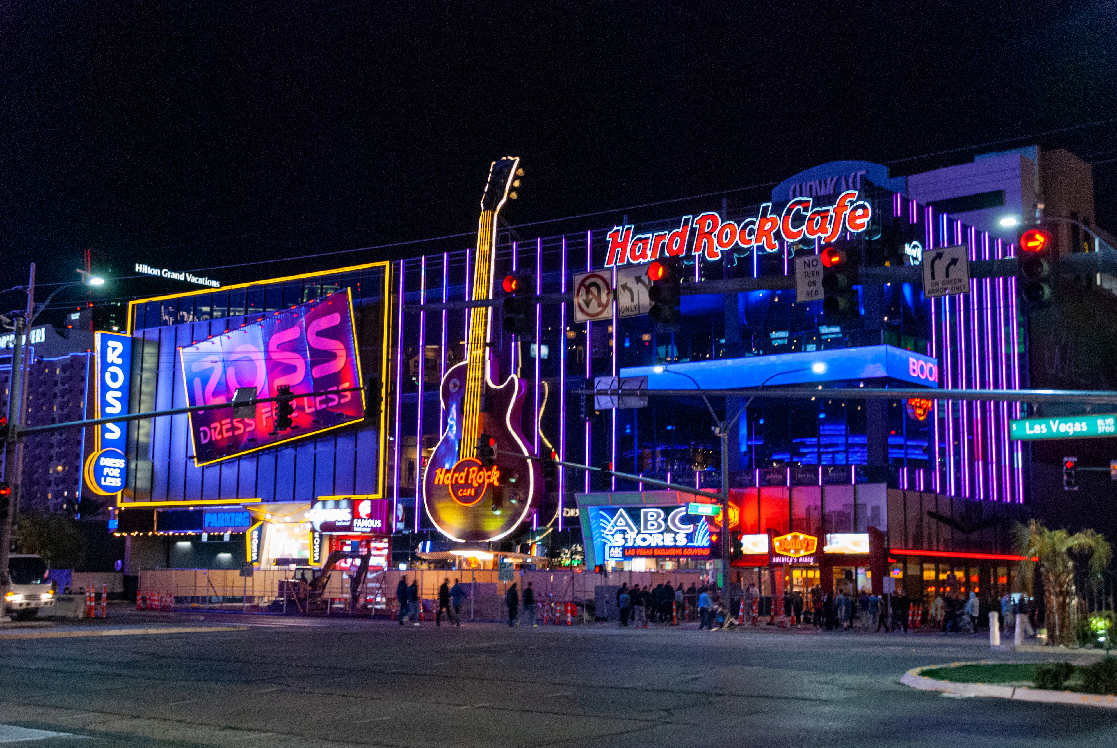 The Las Vegas Strip at night, neon along the sidewalk