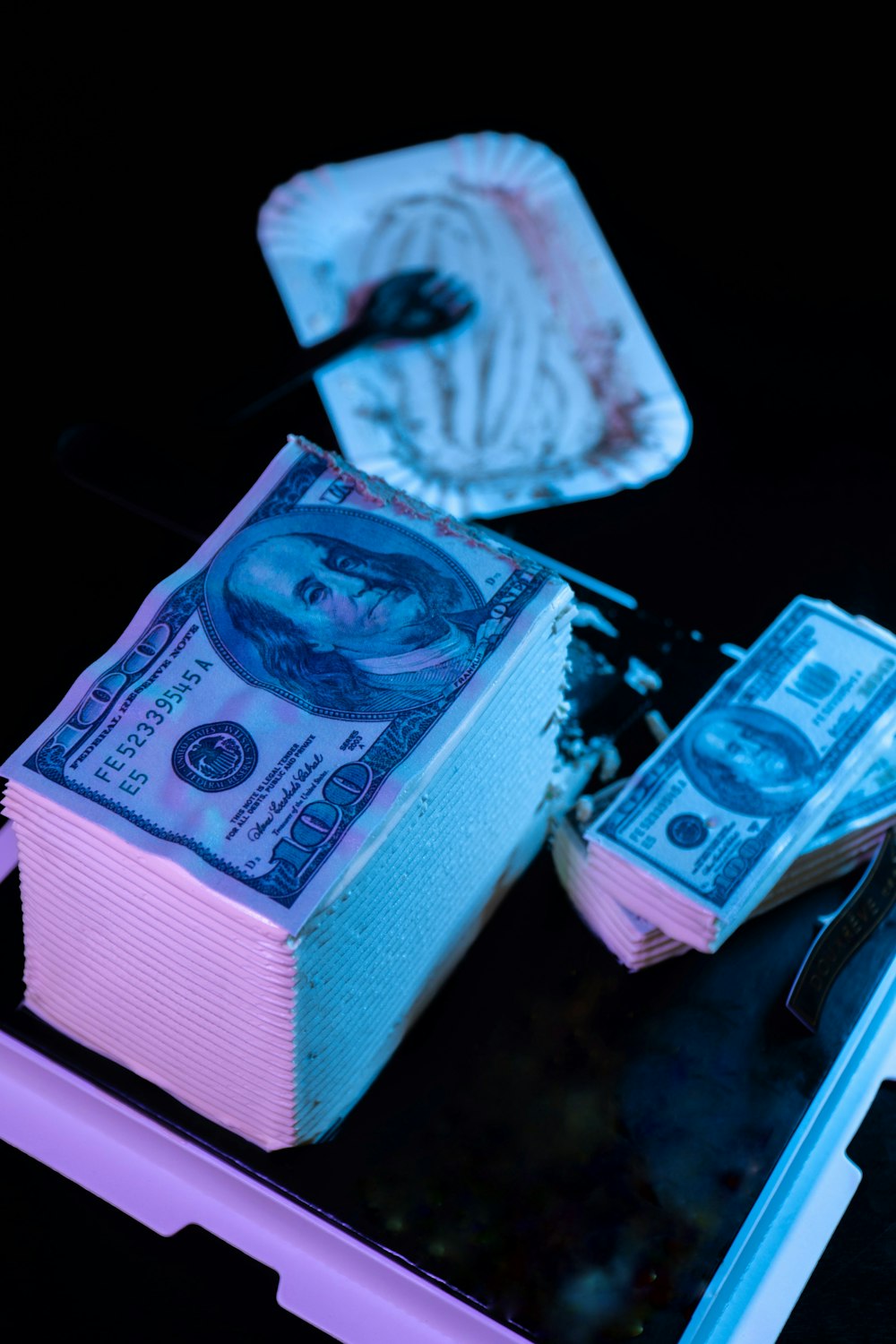 pink and white box on black table