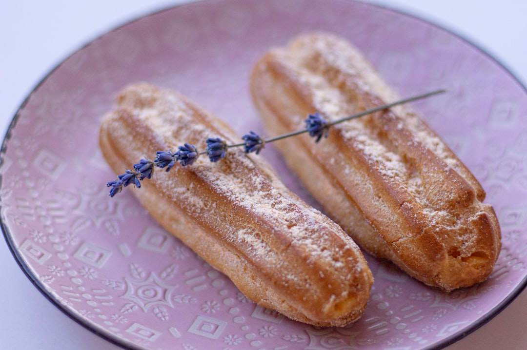 2 bread on white and blue ceramic plate