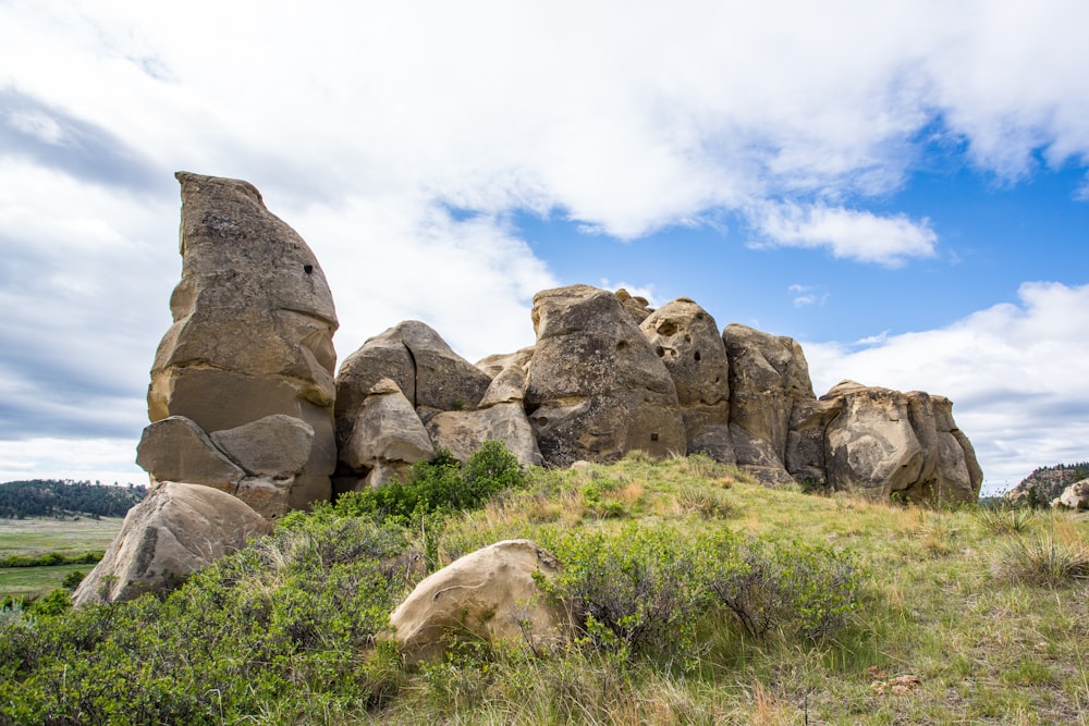 gray rock formation under blue sky during daytime