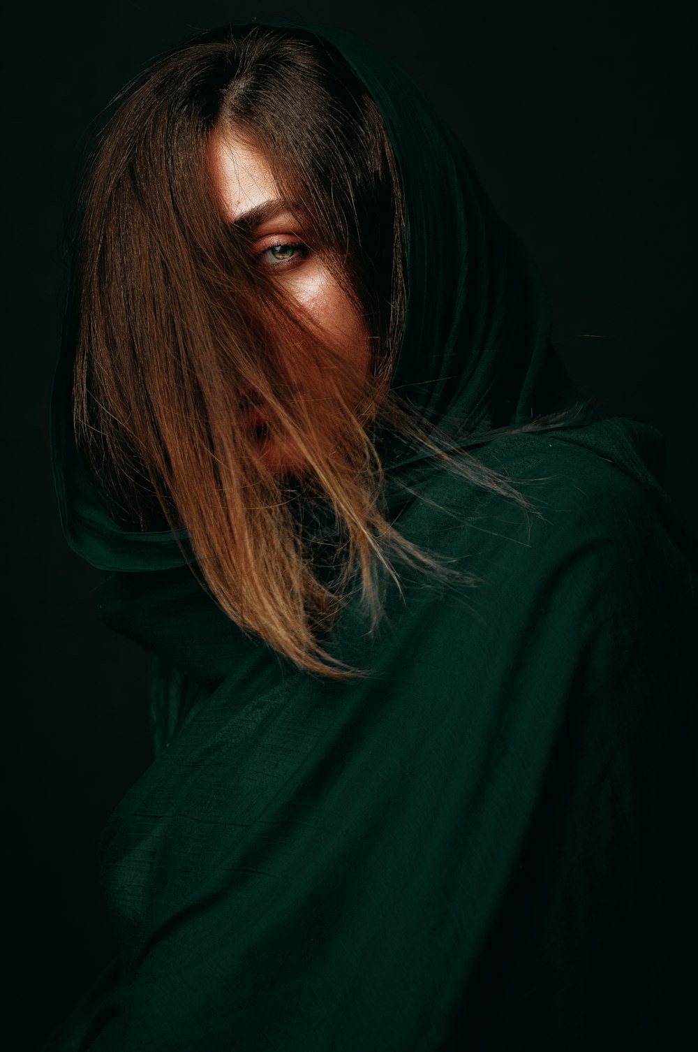 woman in green long sleeve shirt