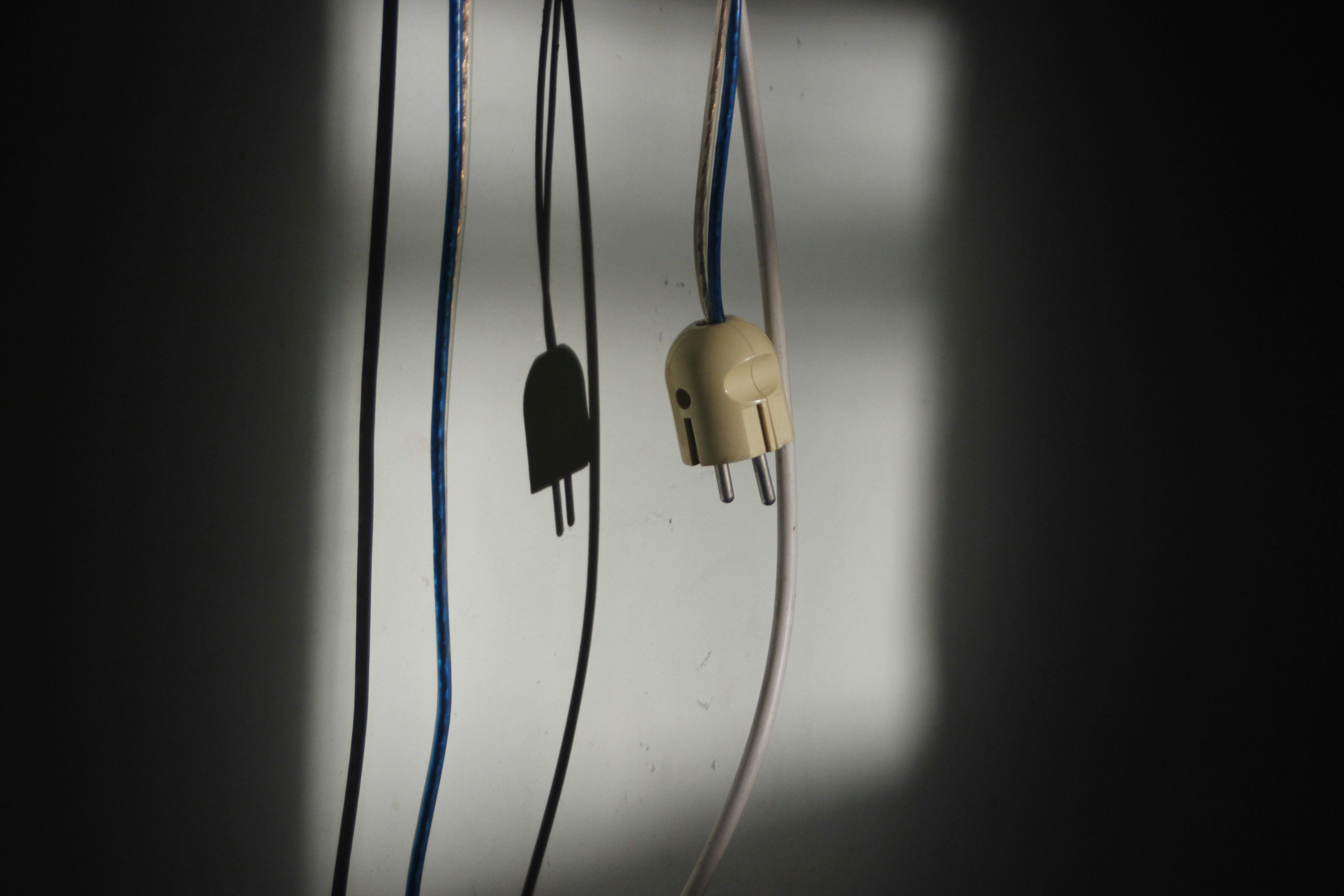 A plug unplugged and dangling.