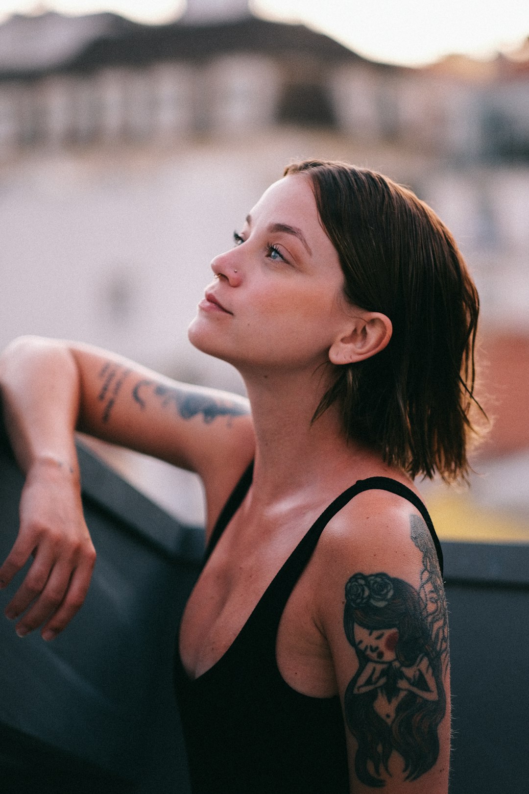 woman in black tank top