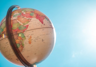 white and red globe under blue sky during daytime