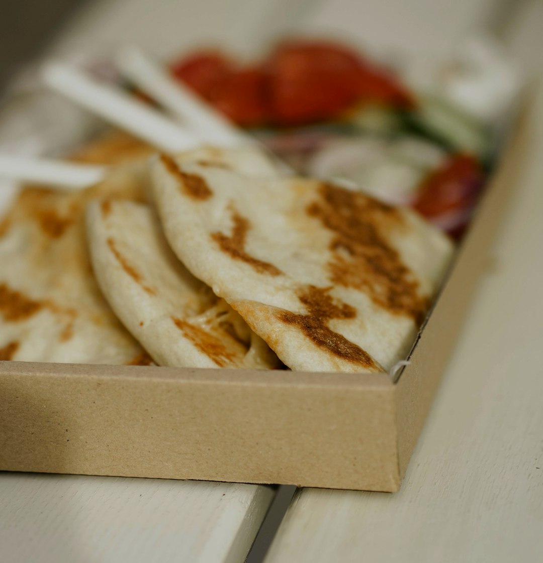 brown and white food in box