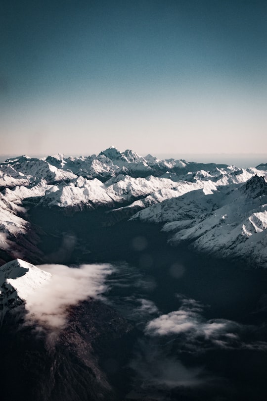 snow covered mountains during daytime in Southern Alps New Zealand