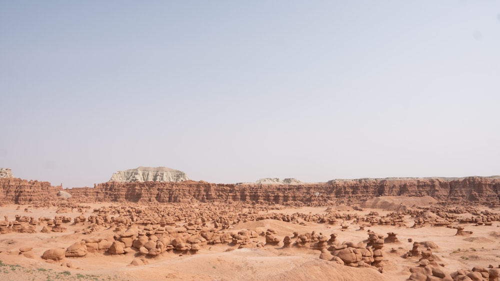 brown rock formation under blue sky during daytime