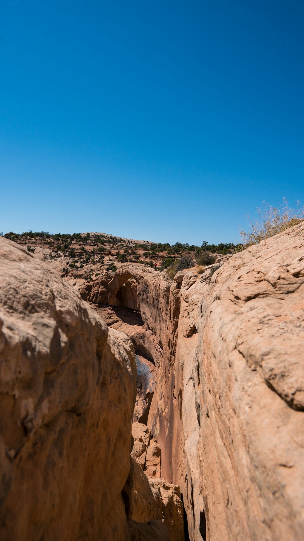 brown rocky mountain under blue sky during daytime