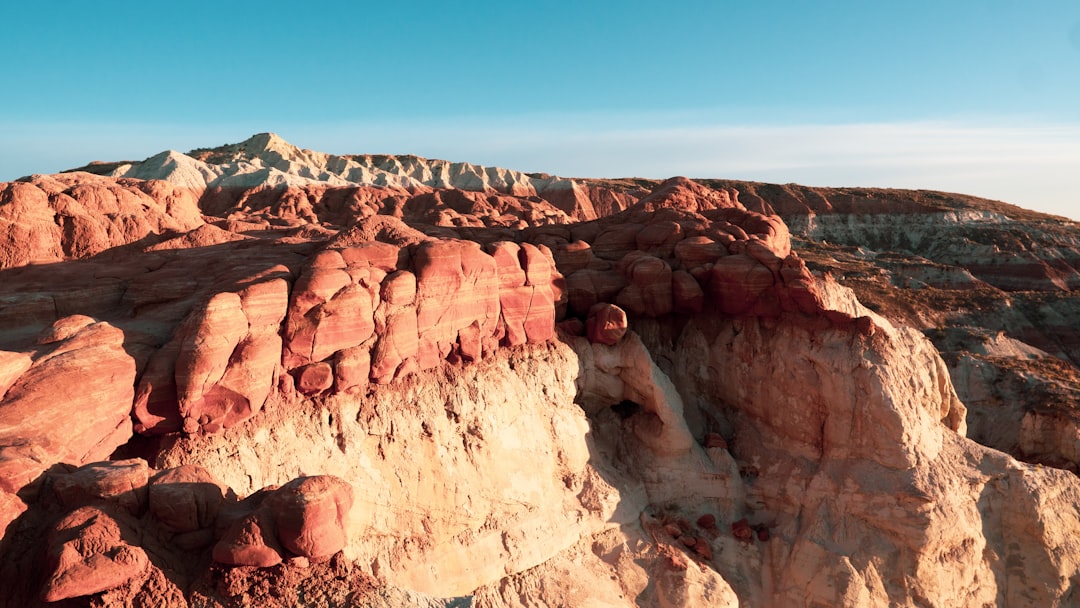 brown rock formation under blue sky during daytime