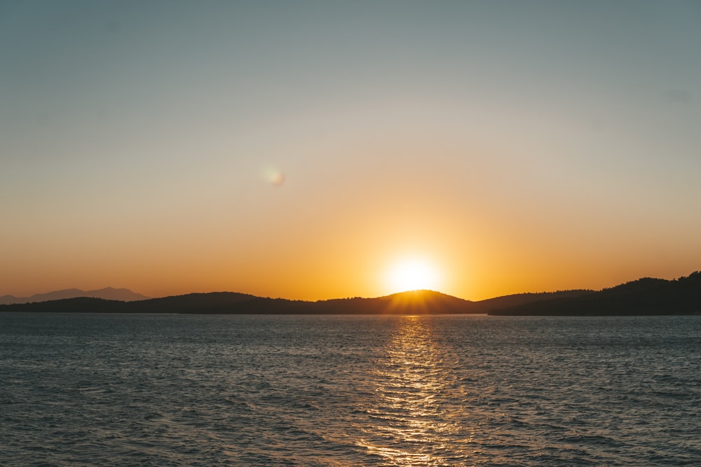 silhouette of mountain during sunset