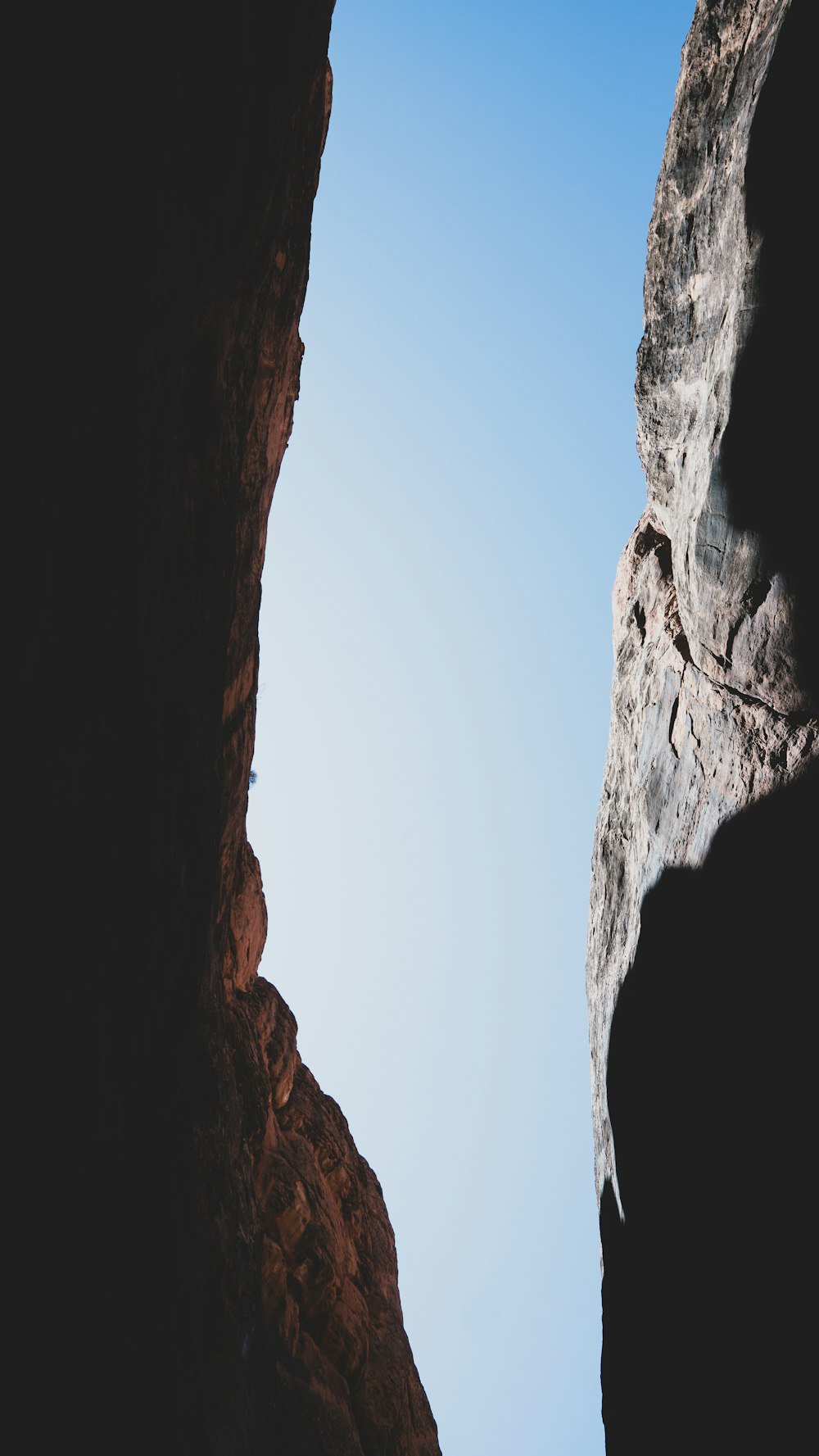 brown rock formation under blue sky during daytime