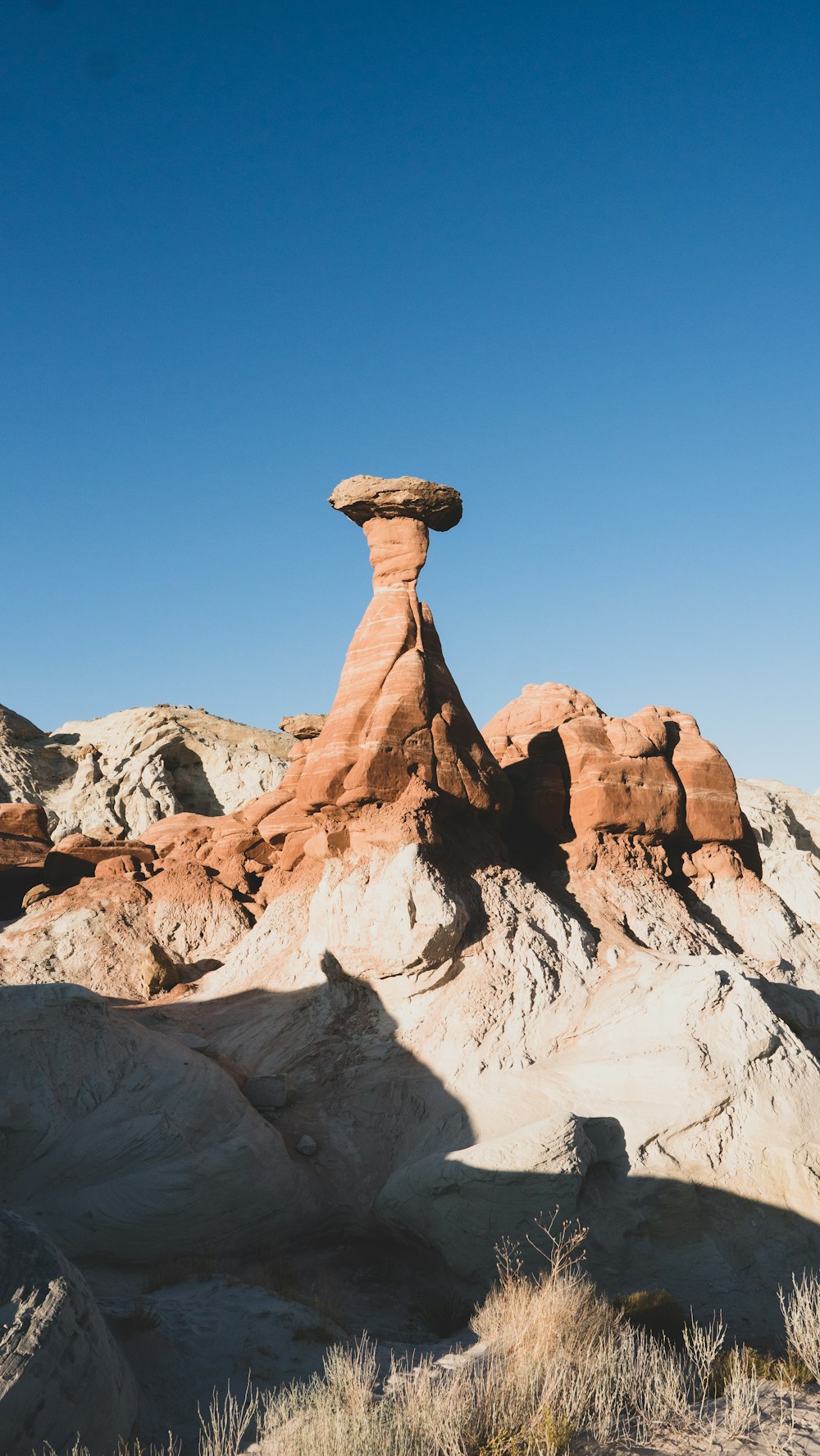 brown rock formation under blue sky during daytime