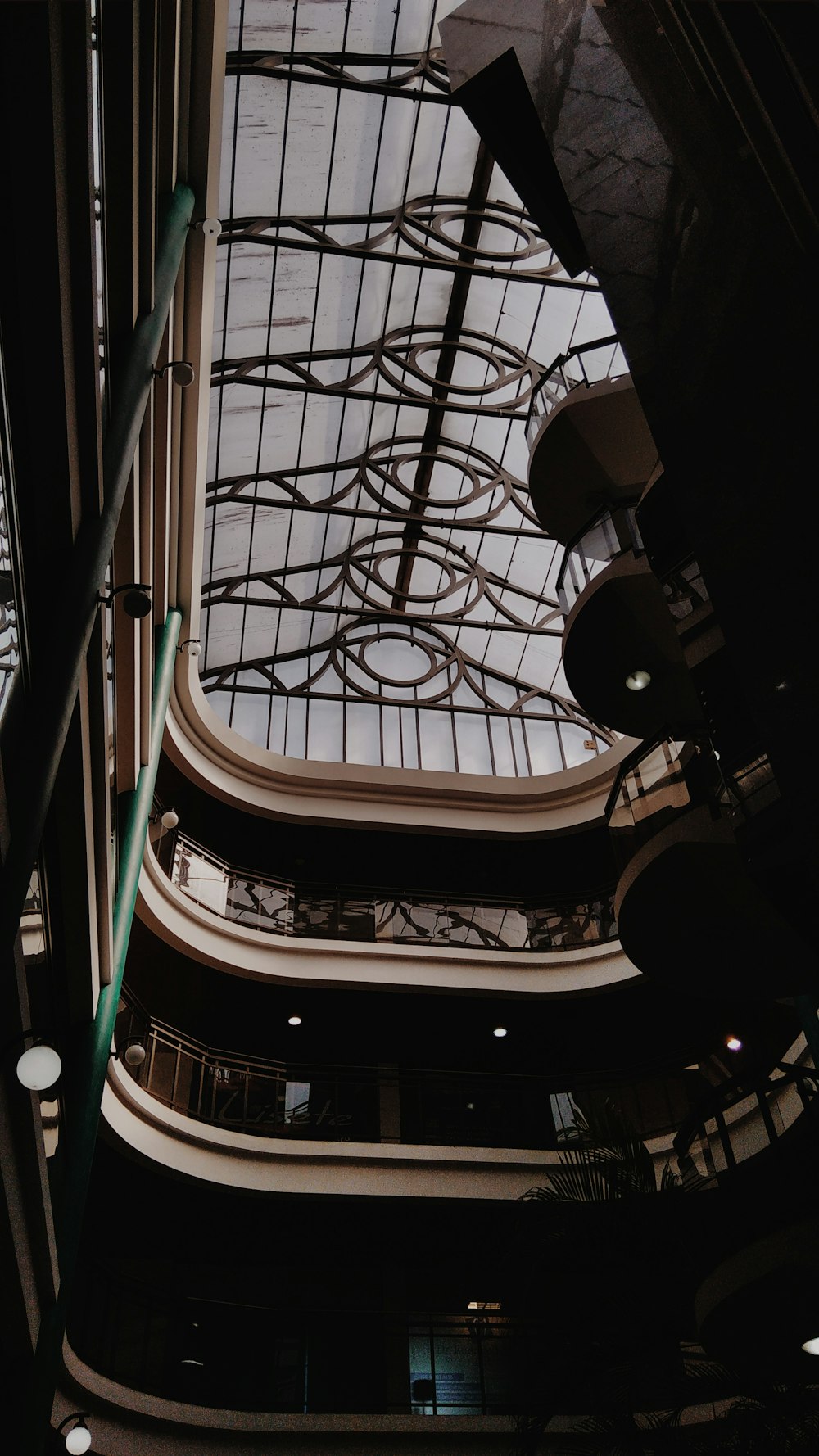 white and brown spiral staircase