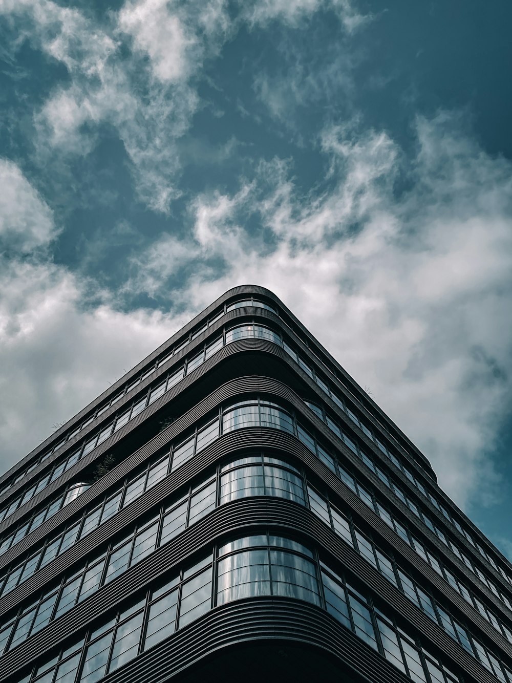 gray concrete building under blue sky during daytime