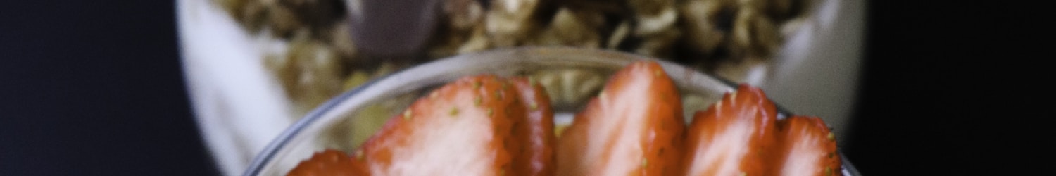 strawberries in clear glass cup