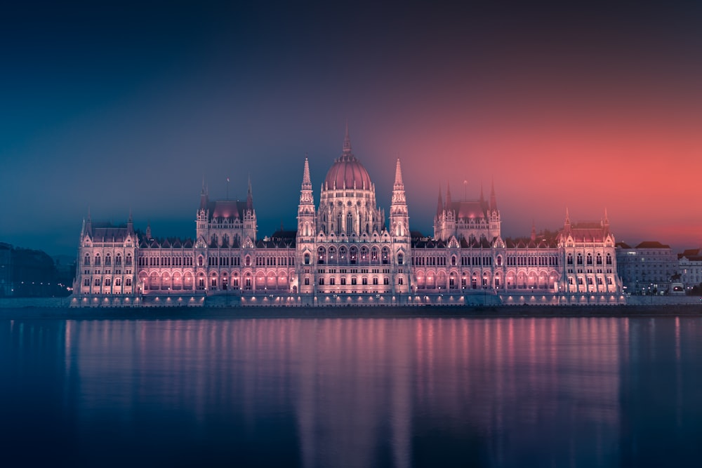 a large building that is next to a body of water