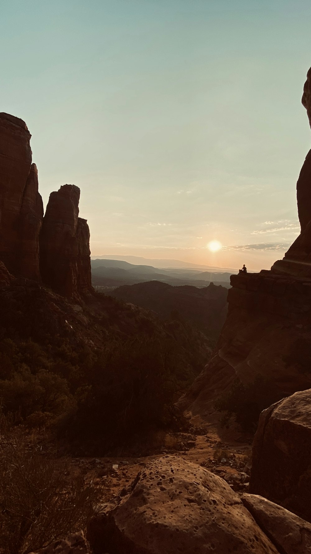 brown rock formation during sunset