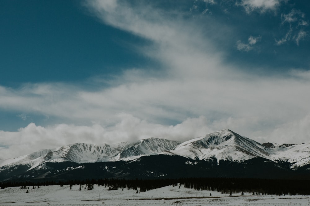 snow covered mountain under blue sky during daytime