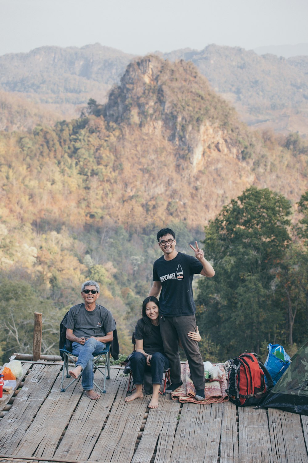 man in black crew neck t-shirt standing beside man in black t-shirt