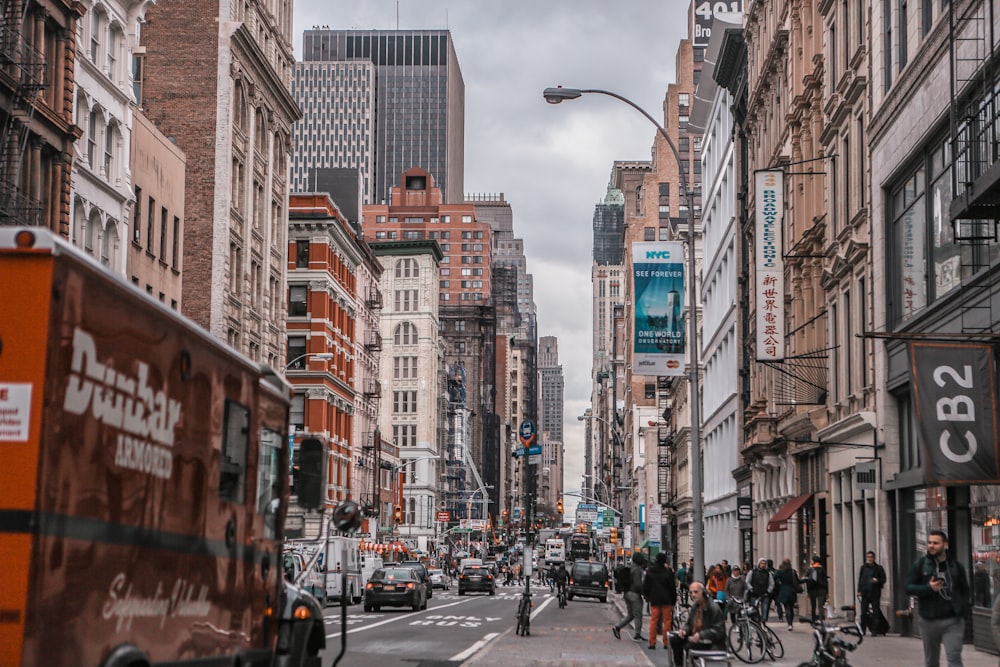 people walking on pedestrian lane during daytime