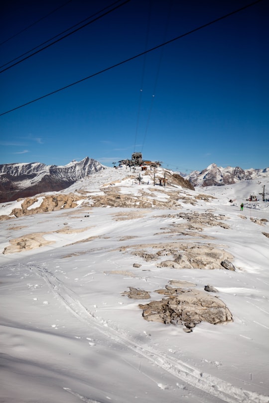 cable cars over snow covered mountain during daytime in Tignes France