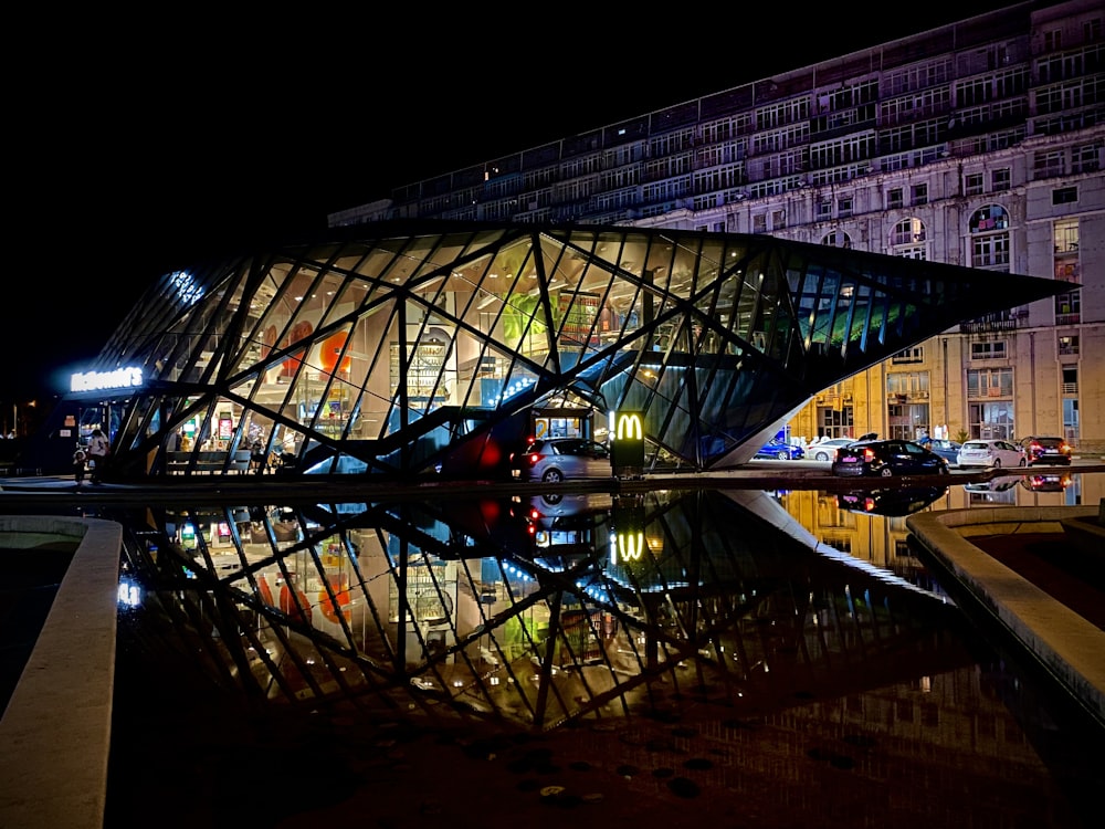 people walking on bridge during night time