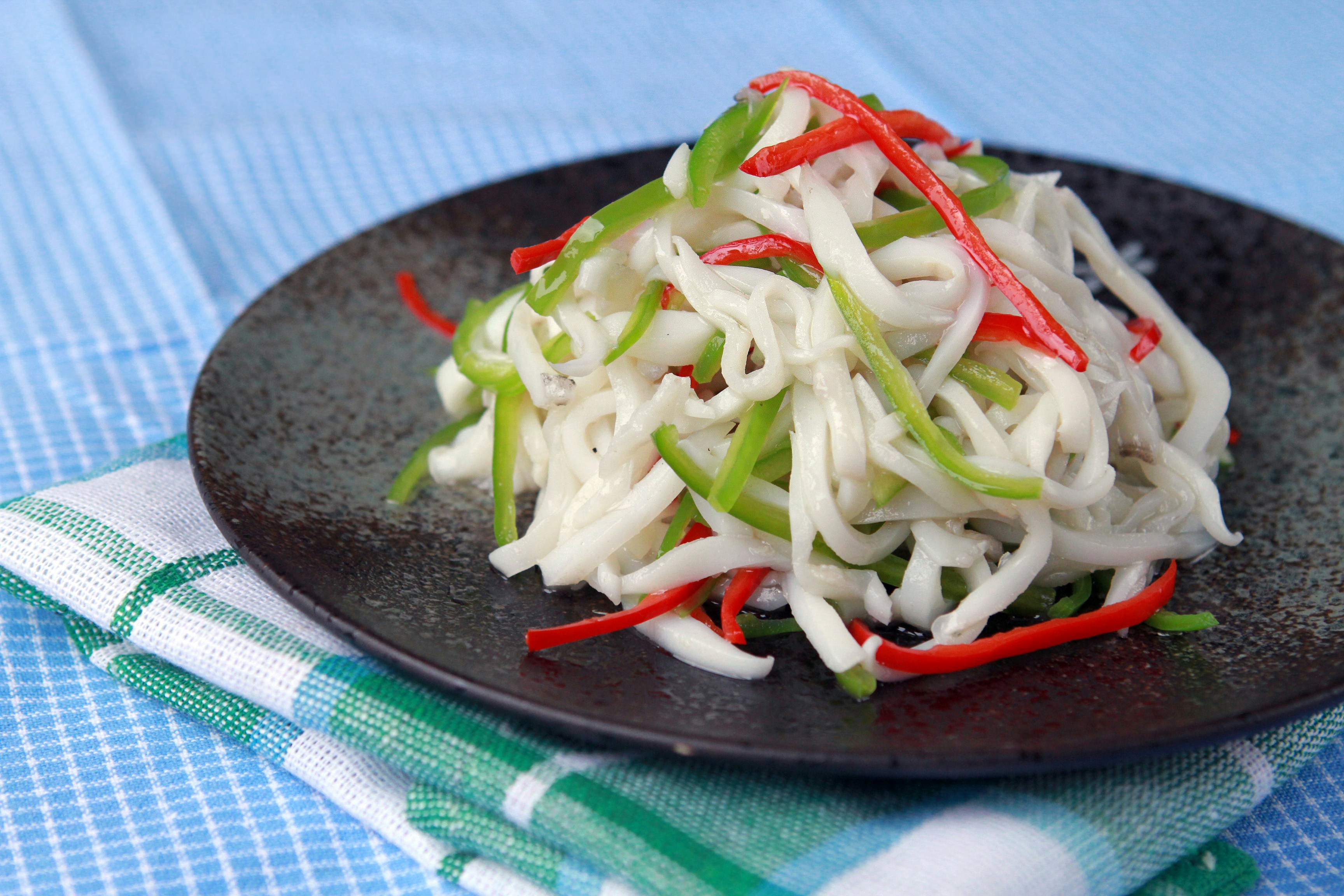 vegetable salad on black plate