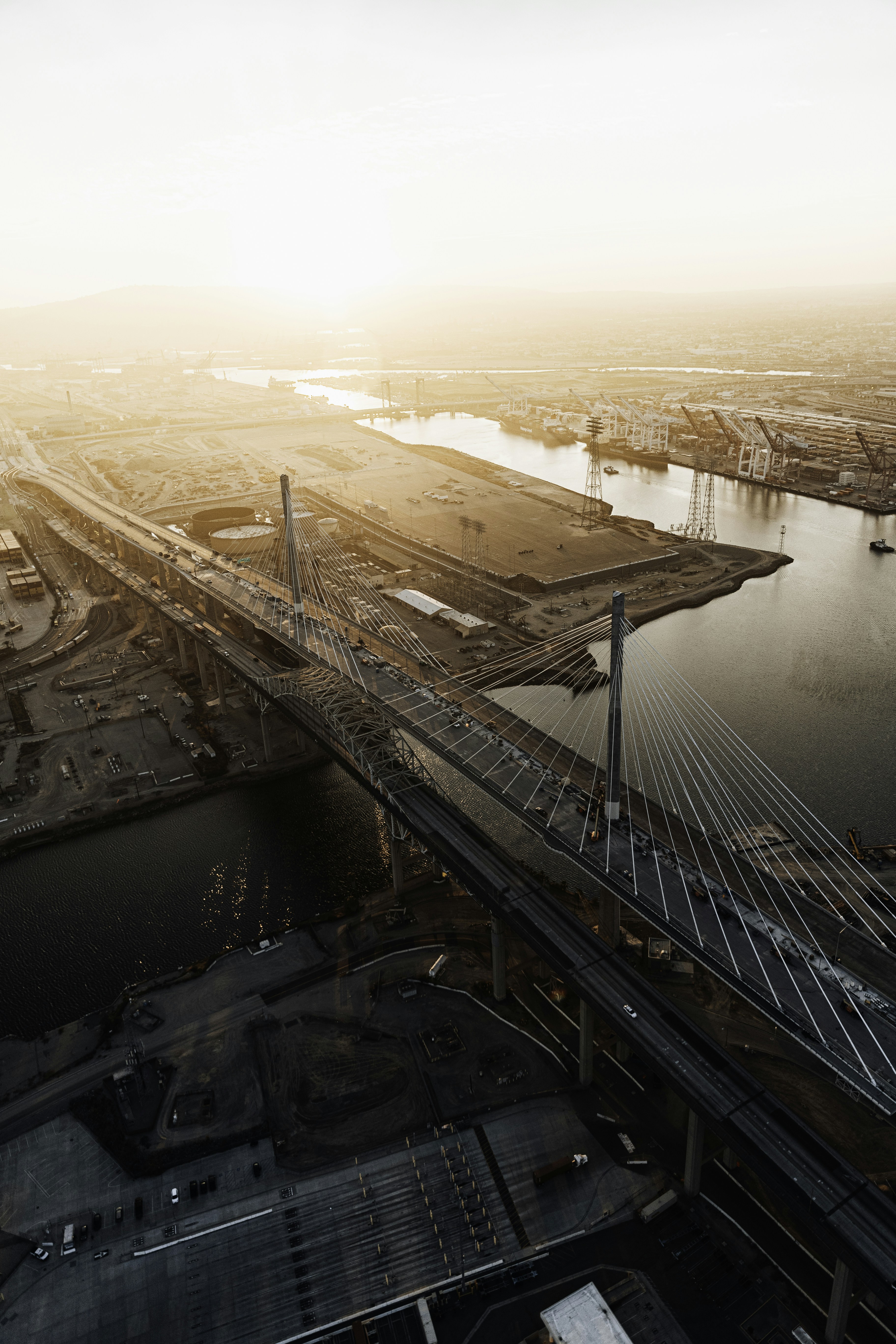 brown bridge over body of water during daytime