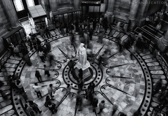 people walking inside building during daytime in Kolkata India