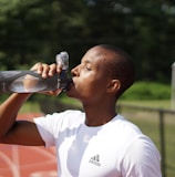 man consuming water-subtitle-stay hydrated time to time-topic-How to Get Lean Mass Body