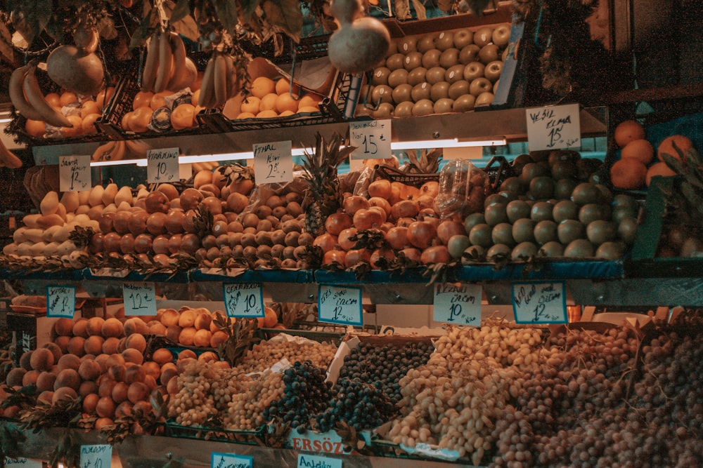 orange and banana fruit on fruit stand