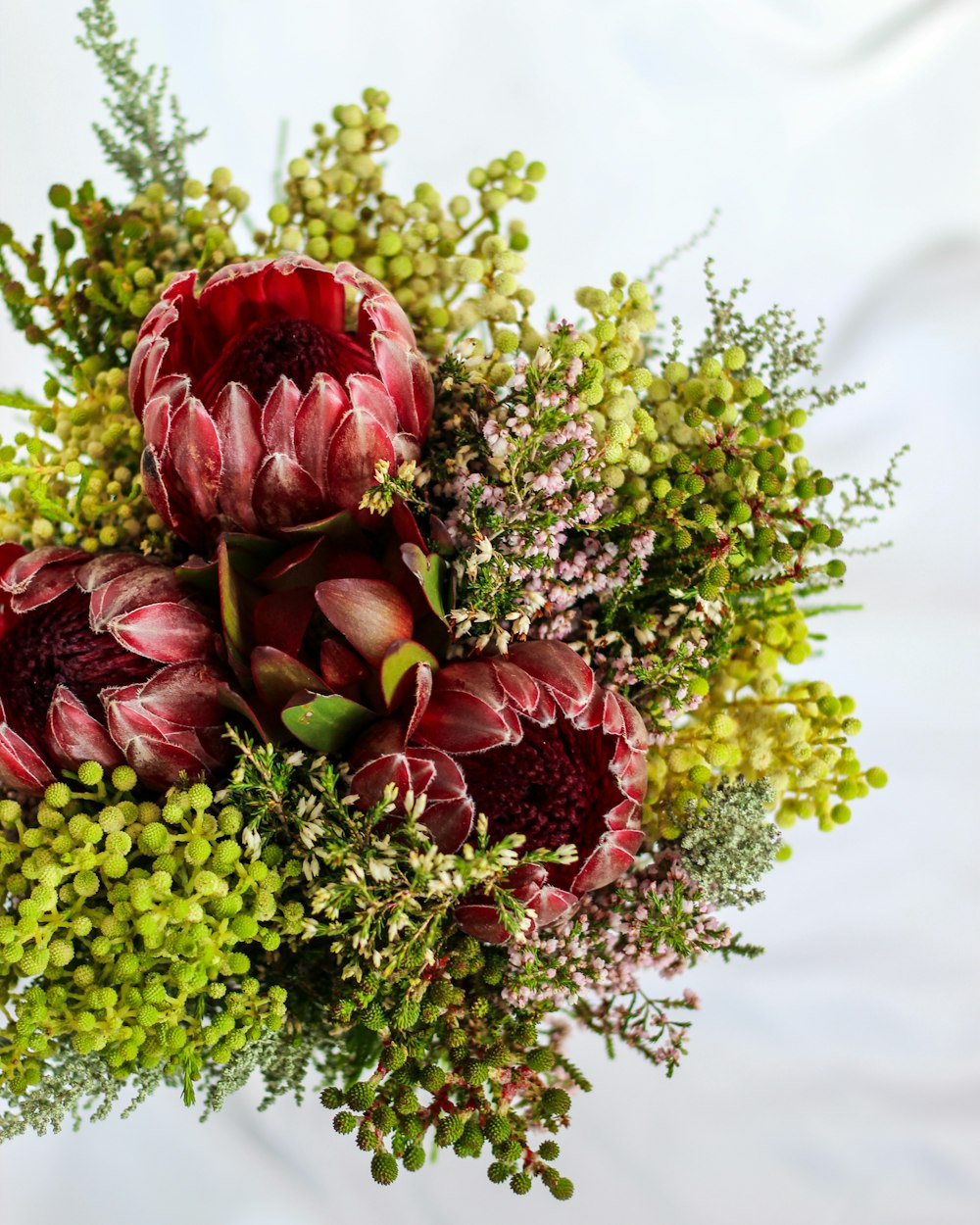 purple and green flower bouquet