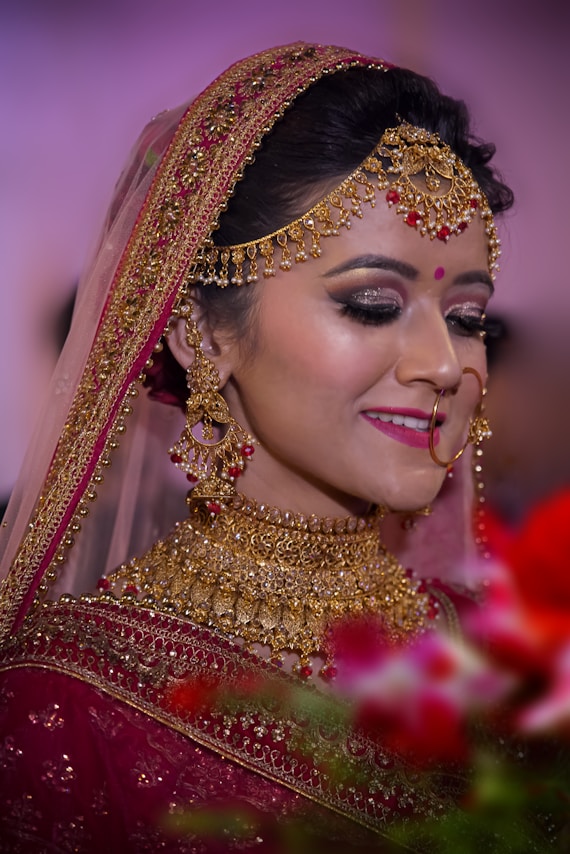 woman in gold and gold crown