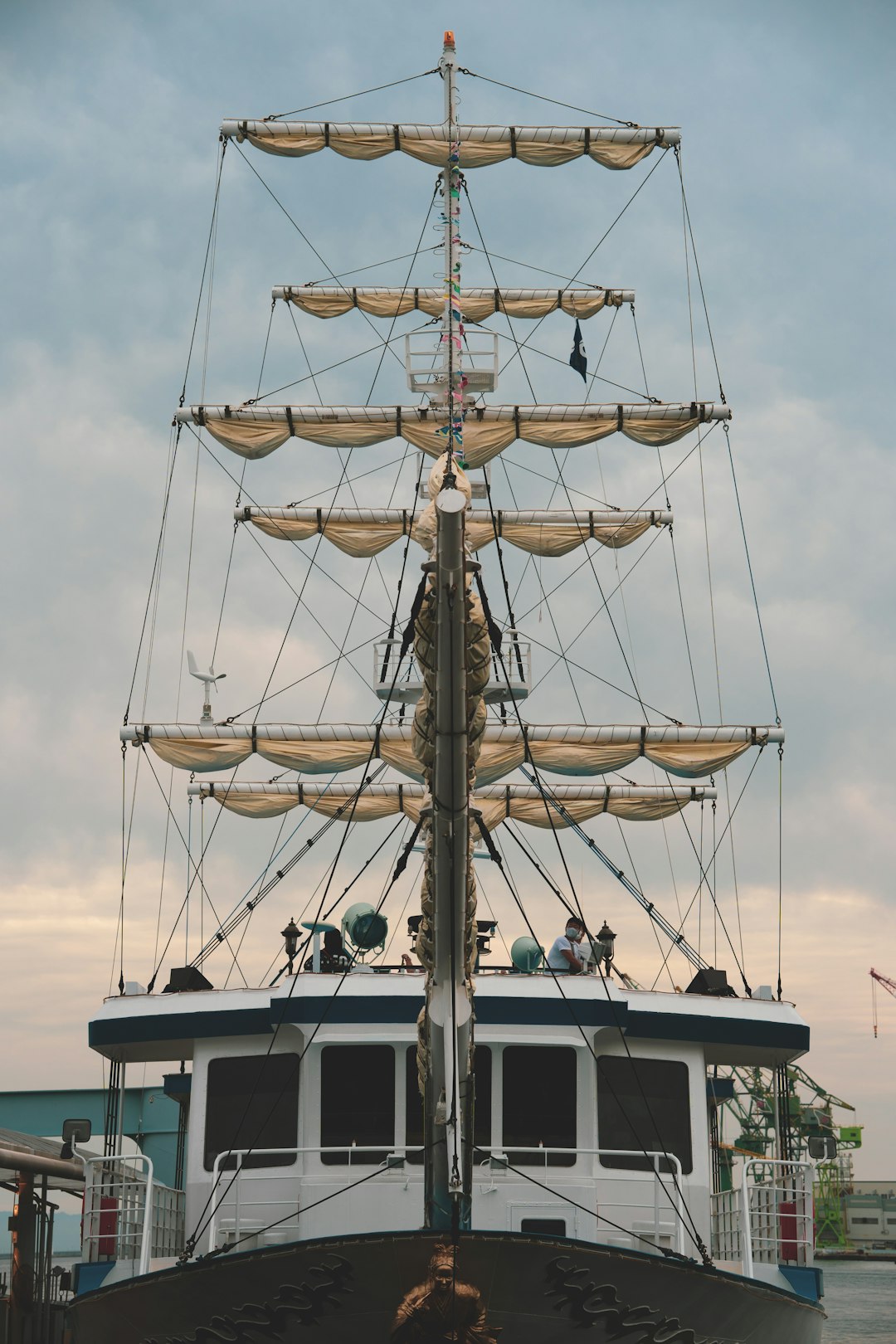 white and black sail boat on sea during daytime