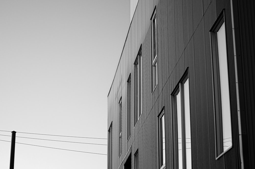 grayscale photo of concrete building