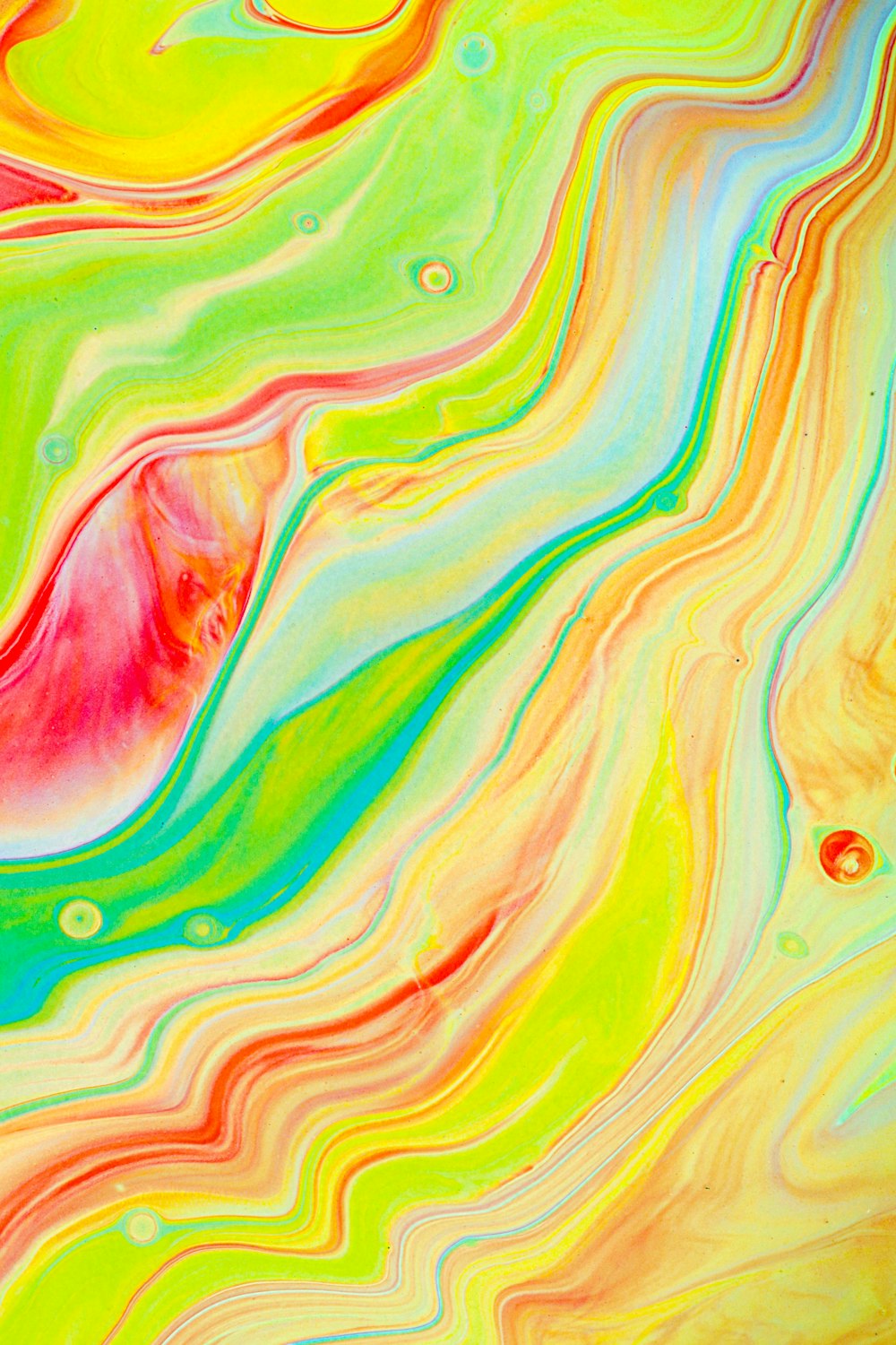 pink green and yellow abstract painting